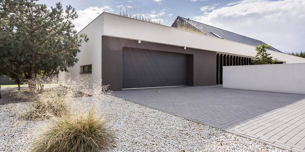 découvrez les prix de construction d'un garage, avec des conseils pour estimer votre budget et choisir les meilleures options adaptées à vos besoins.
